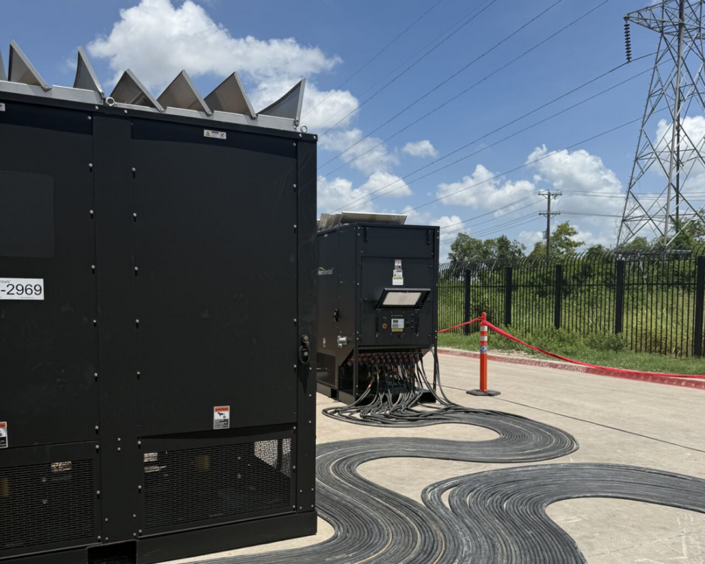 A load bank is pictured outside of a facility. 